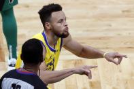 Golden State Warriors' Stephen Curry reacts after making a three-point basket during the second half of an NBA basketball game against the Boston Celtics, Saturday, April 17, 2021, in Boston. (AP Photo/Michael Dwyer)