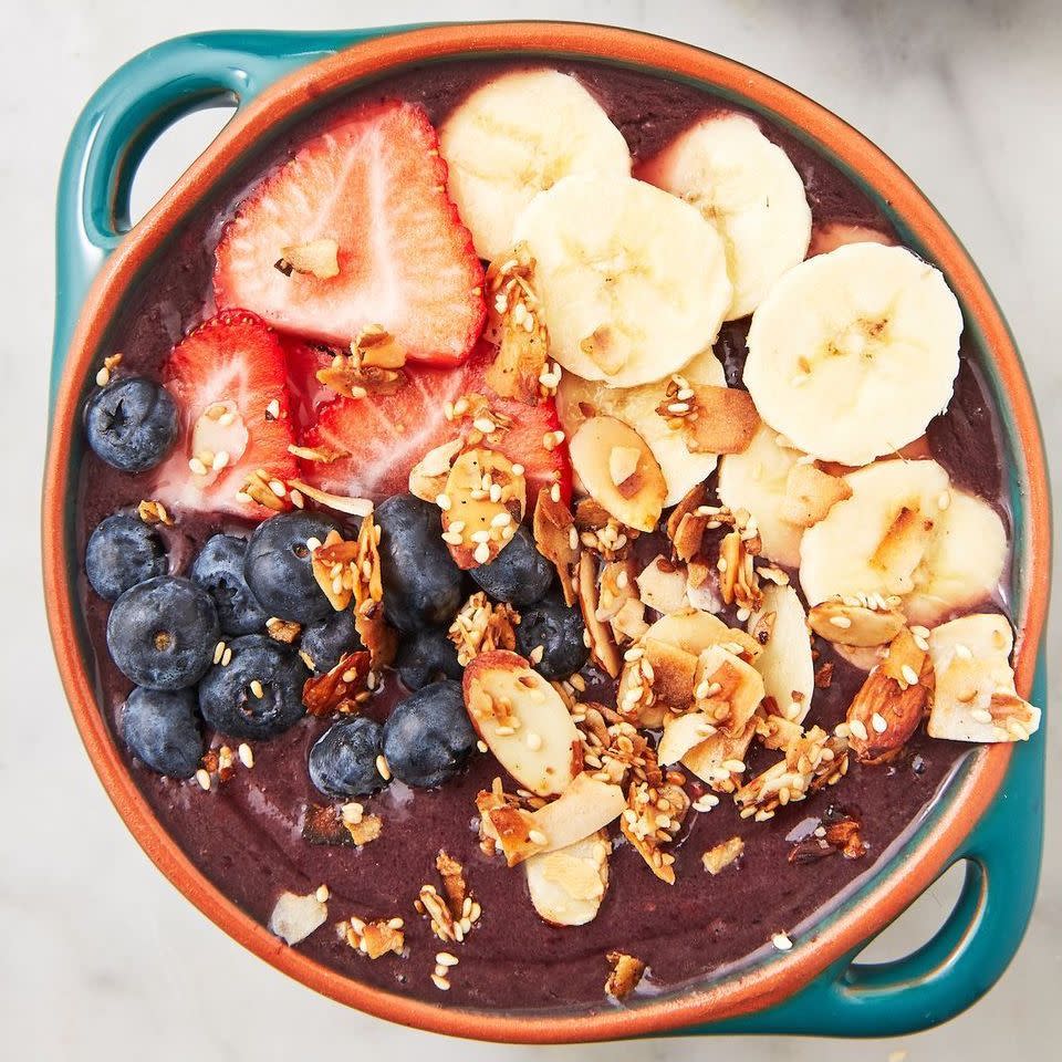 <p>Making this smoothie shop fave at home has two benefits: One, you can make it exactly the way you like it; two, you can control how much sugar is in there. </p><p>Get the <strong><a href="https://www.delish.com/cooking/recipe-ideas/a27469808/acai-bowl-recipe/" rel="nofollow noopener" target="_blank" data-ylk="slk:Açaí Bowl recipe;elm:context_link;itc:0;sec:content-canvas" class="link ">Açaí Bowl recipe</a></strong> from Delish. </p>