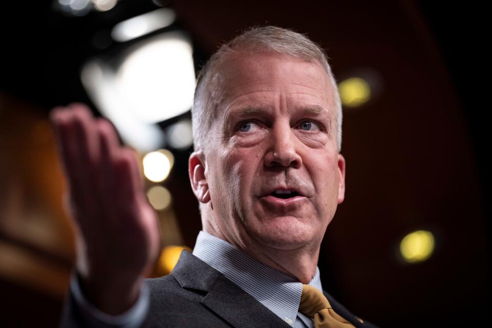 Sen. Dan Sullivan gestures