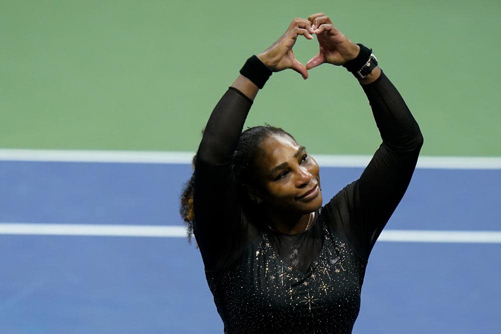 Serena Williams, of the United States, motions a heart to fans after losing to Ajla Tomljanovic, of Australia, during the third round of the U.S. Open tennis championships, Friday, Sept. 2, 2022, in New York. (AP Photo/Frank Franklin II)