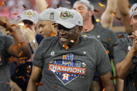 Houston Astros manager Dusty Baker Jr. and the Houston Astros celebrate their 4-1 World Series win against the Philadelphia Phillies in Game 6 on Saturday, Nov. 5, 2022, in Houston. (AP Photo/David J. Phillip)