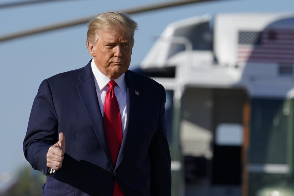 President Donald Trump gives a thumbs up as he walks to board Air Force One, Wednesday, Oct. 14, 2020, at Andrews Air Force Base. (Photo: ASSOCIATED PRESS)