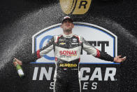 Rinus VeeKay, of the Netherlands, celebrates after winning the IndyCar auto race at Indianapolis Motor Speedway, Saturday, May 15, 2021, in Indianapolis. (AP Photo/Darron Cummings)