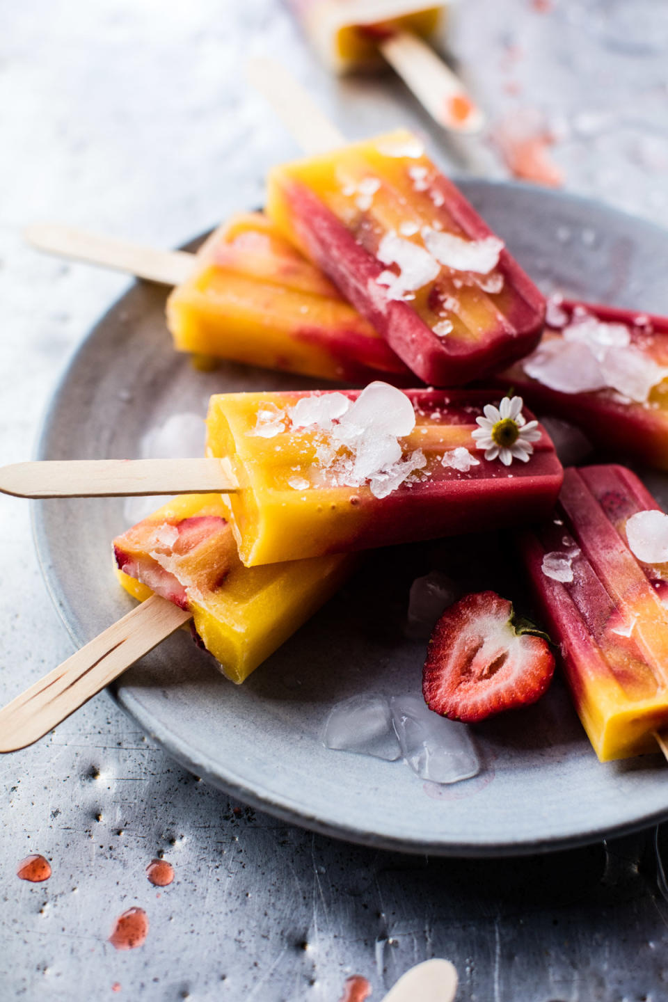 <strong>Get the <a href="http://www.halfbakedharvest.com/3-ingredient-strawberry-mango-popsicles/" target="_blank">3-Ingredient Strawberry Mango Popsicles recipe</a>&nbsp;from Half Baked Harvest</strong>
