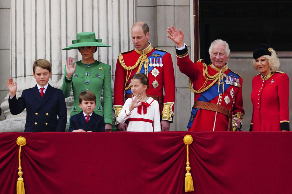 From left, Britain's Prince George, Kate, Princess of Wales, Prince Louis, Prince William, Princess Charlotte, King Charles III and Queen Camilla wave from the balcony of Buckingham Palace following the Trooping the Colour ceremony in central London, Saturday June 17, 2023. (Victoria Jones/PA via AP)
