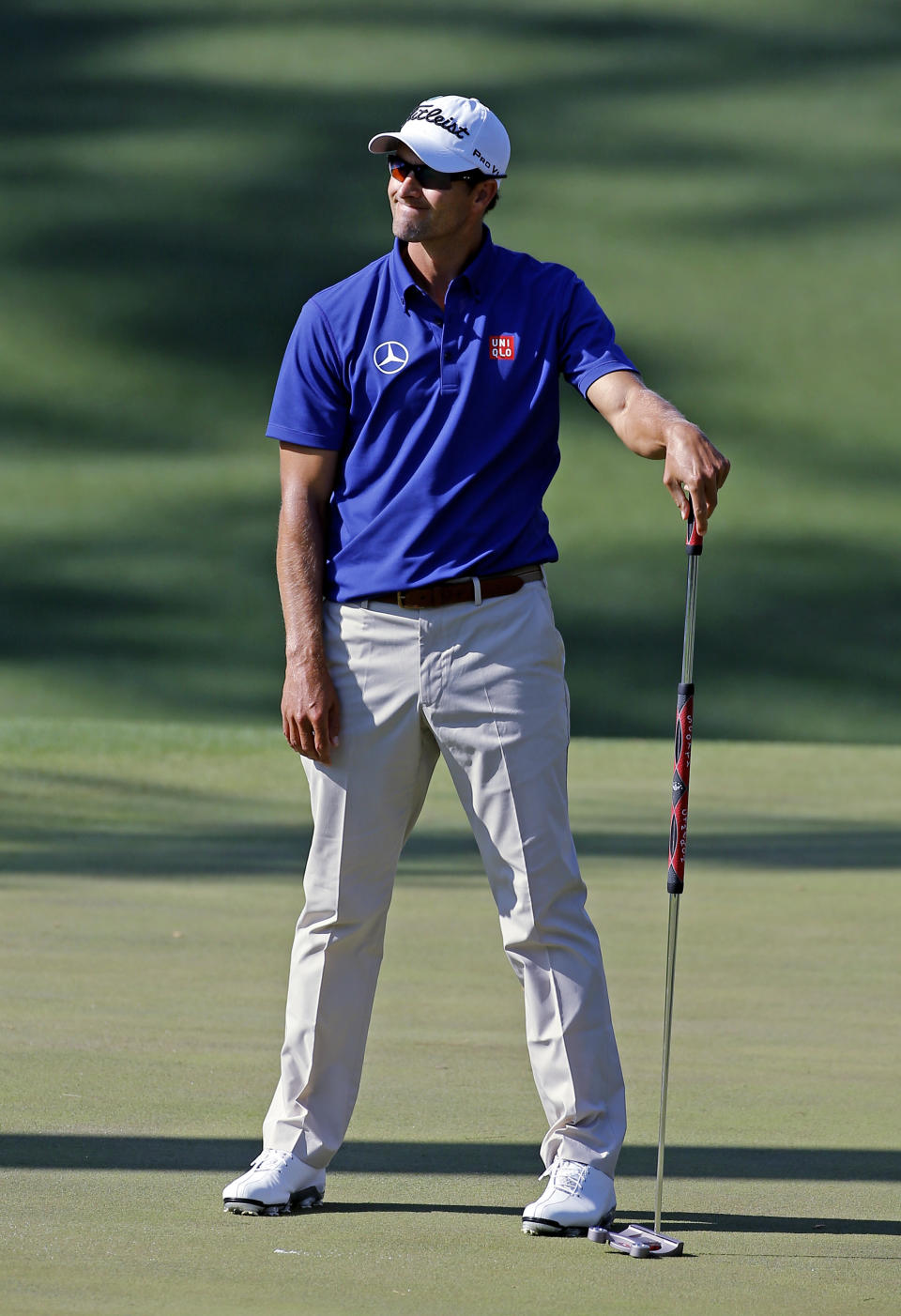 Adam Scott, of Australia, reacts to a missed birdie on the 10th hole during the third round of the Masters golf tournament Saturday, April 12, 2014, in Augusta, Ga. (AP Photo/David J. Phillip)