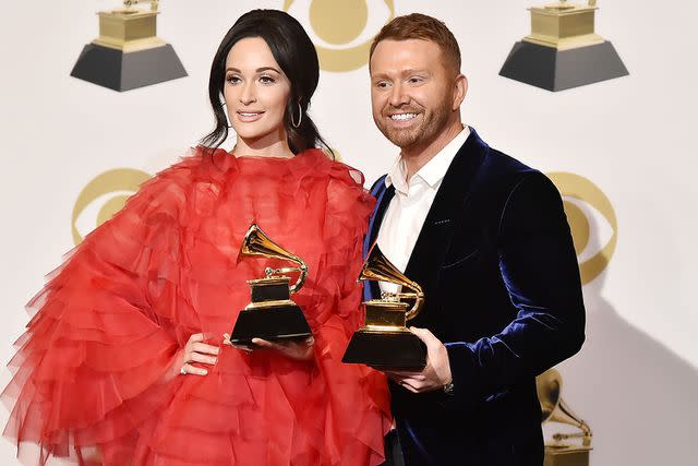 <p>David Crotty/Patrick McMullan via Getty</p> Kacey Musgraves and Shane McAnally at the Grammys in Los Angeles in February 2019