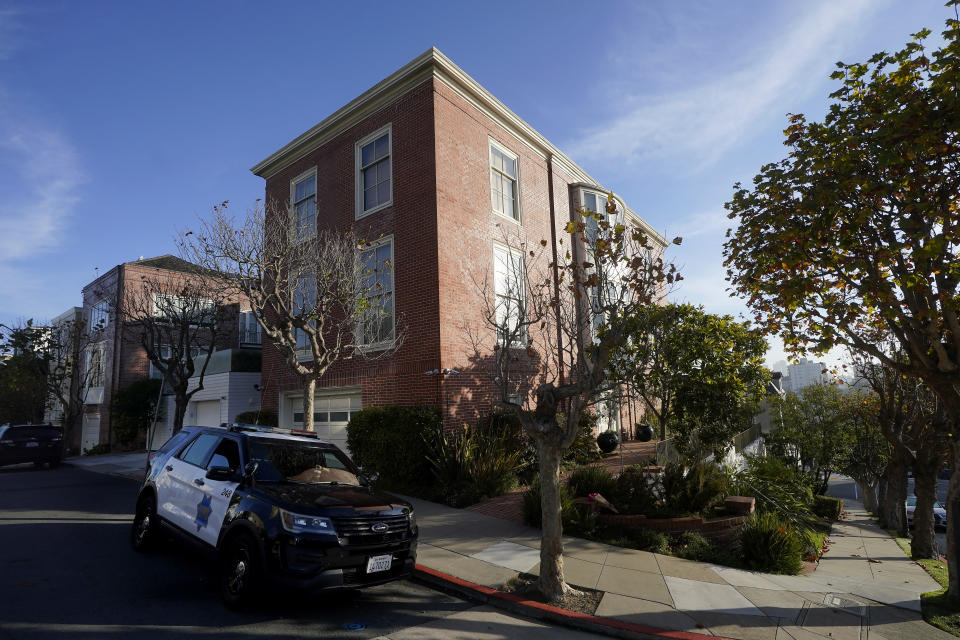 FILE - A San Francisco Police Department vehicle parks outside the home of Speaker of the House Nancy Pelosi, in San Francisco, Saturday, Oct. 29, 2022. On Friday, Nov. 4, The Associated Press reported on stories circulating online incorrectly claiming the attack on Paul Pelosi was a “Domestic Violence Case in a consensual sexual relationship." (AP Photo/Jeff Chiu, File)