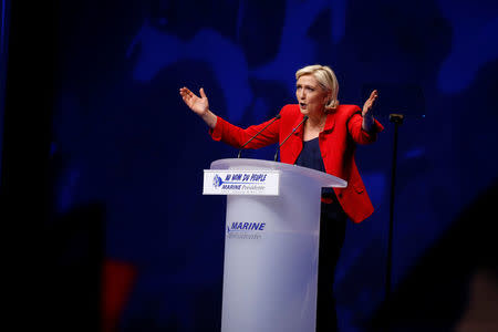 Marine Le Pen, French National Front (FN) political party leader and candidate for French 2017 presidential election, attends a political rally in Lille, France, March 26, 2017.REUTERS/Pascal Rossignol