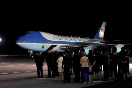 The plane carrying U.S. President Donald Trump arrives at Paya Lebar Air Base in Singapore, before his summit with North Korean leader Kim Jong Un, June 10, 2018. REUTERS/Kim Kyung-Hoon