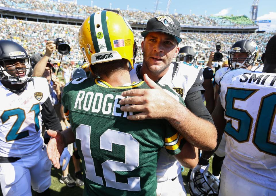 Sep 11, 2016; Jacksonville, FL, USA;  Green Bay Packers quarterback Aaron Rodgers (12) and Jacksonville Jaguars quarterback Blake Bortles (5) shake hands after a gam at EverBank Field.  Green Bay Packers won 27-23. Mandatory Credit: Logan Bowles-USA TODAY Sports 


