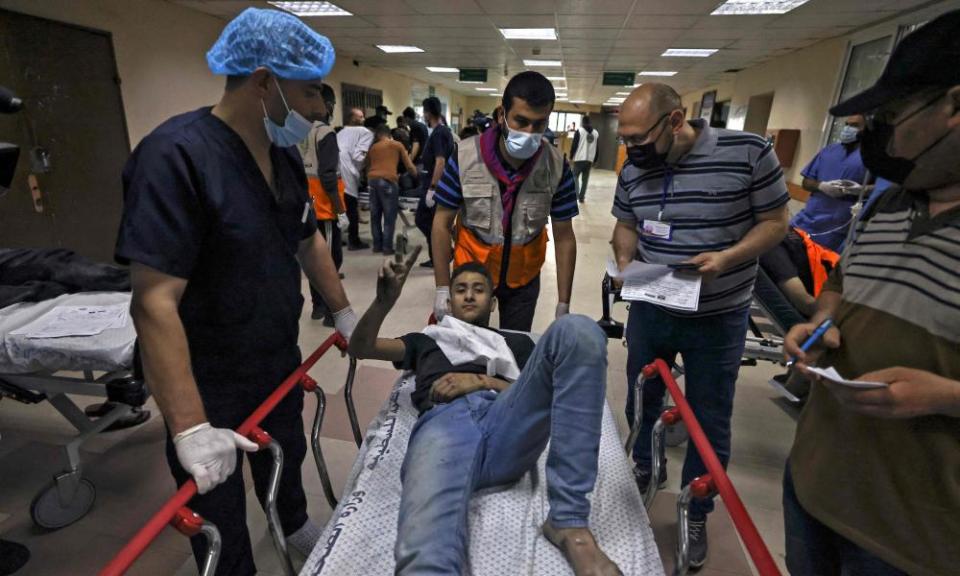 Another injured Palestinian man arrives at al-Shifa hospital