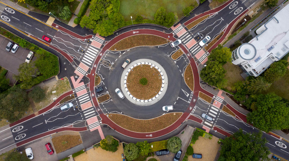 The UK's first Dutch-style roundabout � which prioritises cyclists and pedestrians over motorists � has opened in Fendon Road, Cambridge. The cost of the scheme, originally estimated at around GBP 800,000, has almost trebled to GBP 2.3m at the end of the project.