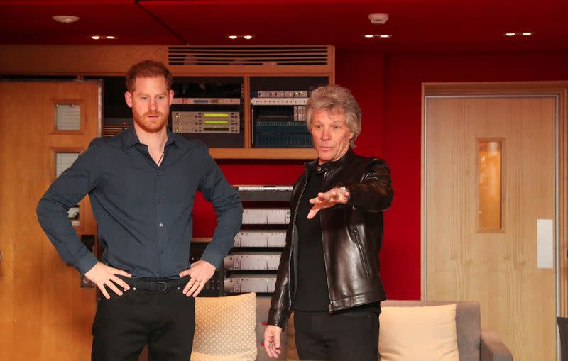 Britain's Prince Harry meets Jon Bon Jovi at Abbey Road Studios in London
