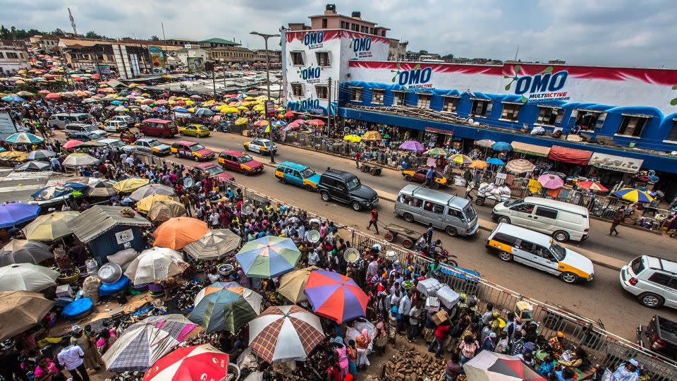 The Kejetia Market in Kumasi, Ghana, is said to be the biggest market in West Africa. It's overflowing with food options to soak up any beverages. - Anthony Pappone/Moment RF/Getty Images