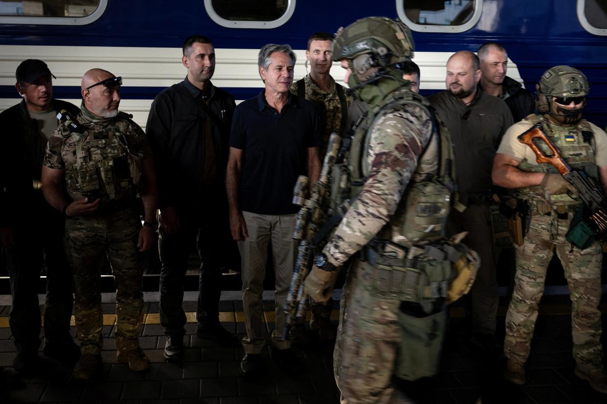 US Secretary of State Antony Blinken stands next to Ukrainian security forces before departing at the Kyiv-Pasazhyrskyi station in Kyiv (via REUTERS)