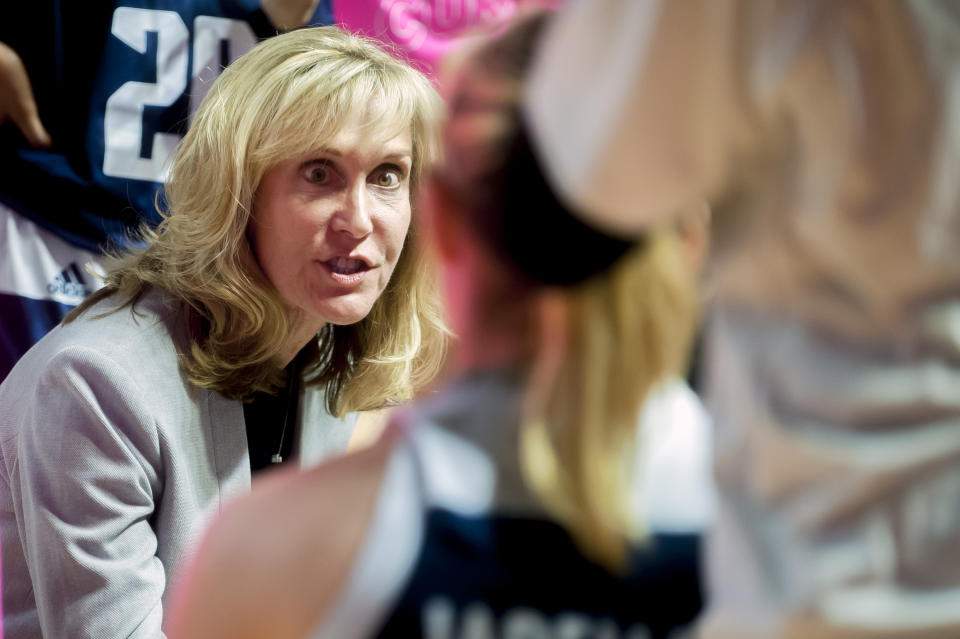 FILE - In this Feb. 7, 2019, file photo, Rice coach Tina Langley talks to players during an NCAA college basketball game against Western Kentucky, in Bowling Green, Ky. Buoyed by the second-longest winning streak in the country, Rice has entered The Associated Press women’s basketball poll for the first time in school history. The Owls have won 15 straight games and are ranked 25th in Monday’s poll. (Bac Totrong/Daily News via AP, File)/