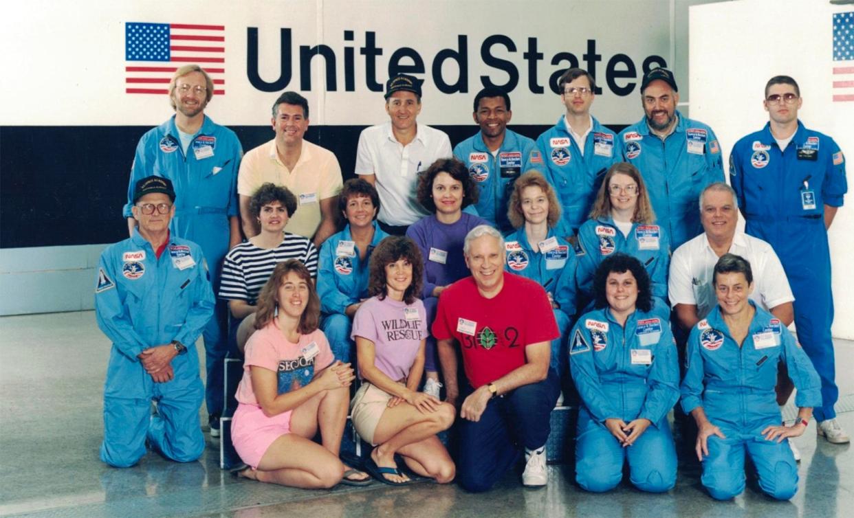 Dave Gardner is second from left, back row in the yellow shirt. Jean (Patz) Gardner is second from the left in the middle row, striped shirt. The photo is from their honeymoon at the space camp in Huntsville, Ala.