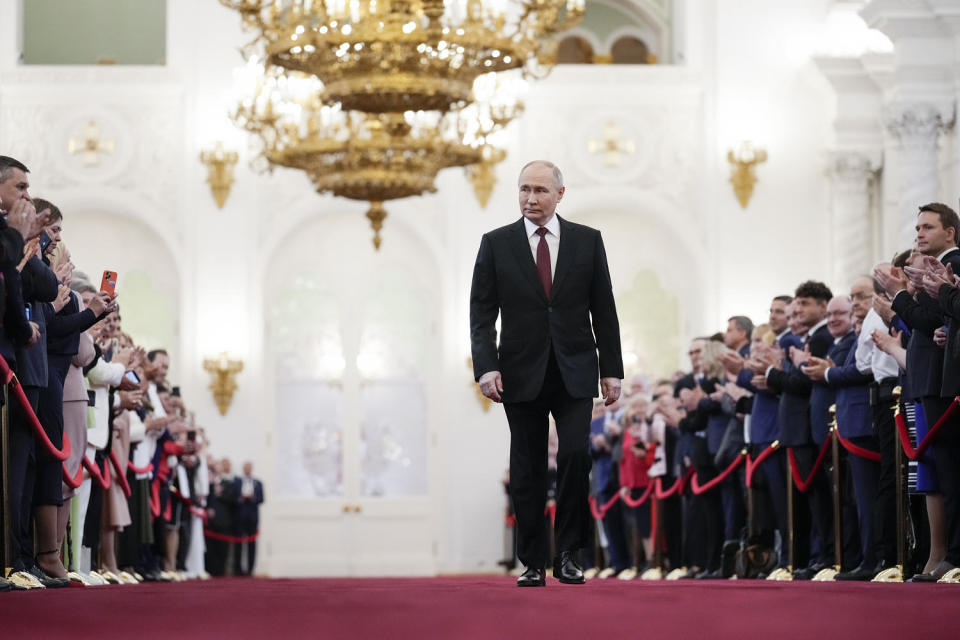 Vladimir Putin walks to take his oath as Russian president during an inauguration ceremony in the Grand Kremlin Palace in Moscow. (Alexander Zemlianichenko / AP)