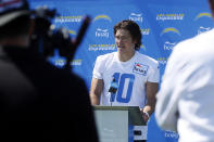 Los Angeles Chargers quarterback Justin Herbert talks during a news conference after practice at the NFL football team's training camp in Costa Mesa, Calif., Wednesday, July 28, 2021. (AP Photo/Alex Gallardo)