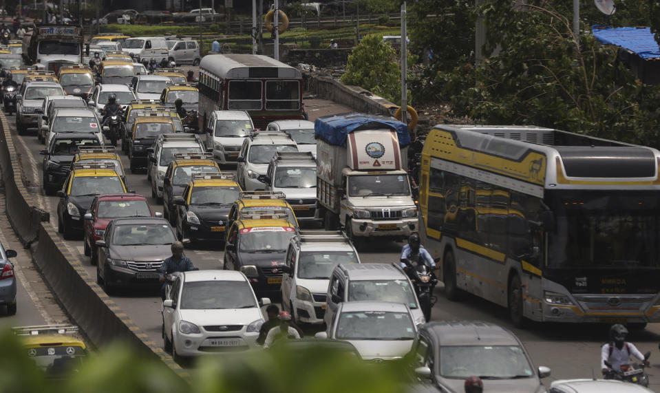 Traffic is seen on the road in Mumbai, India, June 7, 2021. Businesses in two of India's largest cities, New Delhi and Mumbai, were reopening as part of a phased easing of lockdown measures in several states now that the number of new coronavirus infections in the country is on a steady decline. / Credit: Rafiq Maqbool/AP