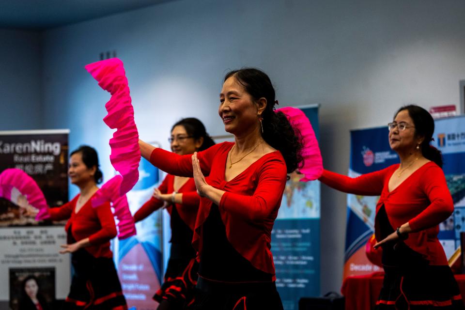 Good Fortune Forever performs a fan dance during a Chinese New Year Celebration hosted by the Chinese Association of Iowa at Grand View University on Saturday, Feb. 10, 2024, in Des Moines.