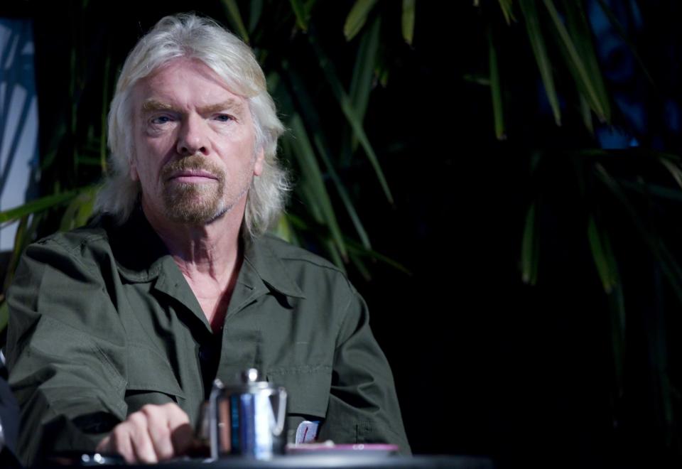 Business entrepreneur Branson attends a Virgin Mobile news conference to launch a new service in Paris