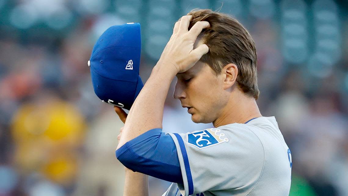 Kansas City Royals starting pitcher Brady Singer reacts after walking in a run in the third inning of a baseball game against the San Francisco Giants in San Francisco, Monday, June 13, 2022. (AP Photo/Josie Lepe)