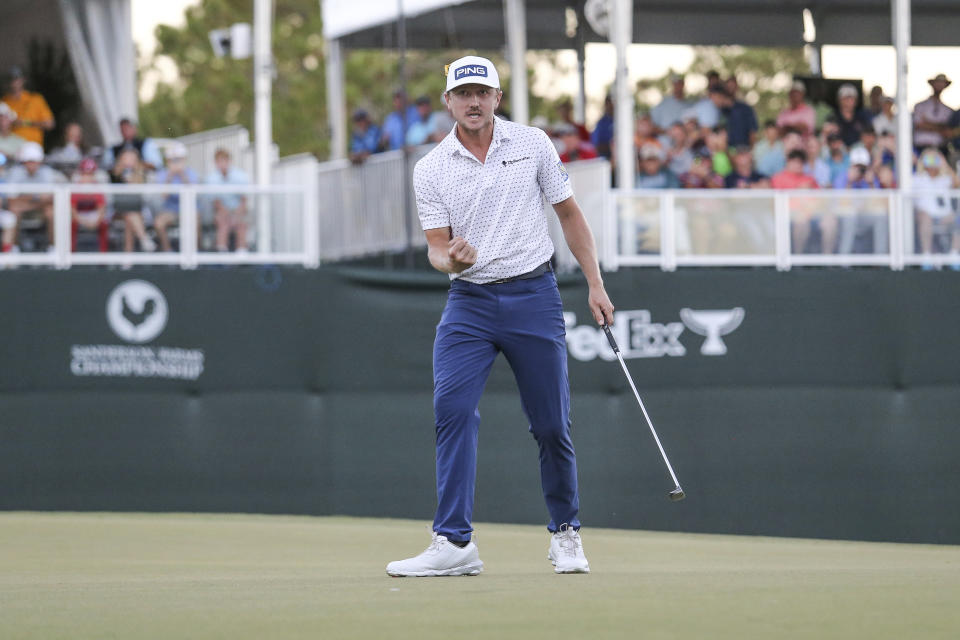 Mackenzie Hughes, of Canada, reacts after winning the Sanderson Farms Championship golf tournament in Jackson, Miss., Sunday, Oct. 2, 2022. (James Pugh/impact601.com via AP)