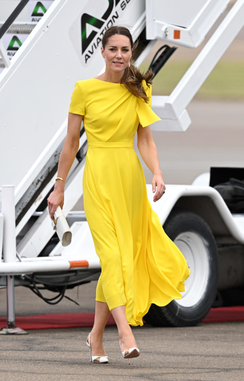 The royal mother-of-three previously wore the bright look for the Caribbean tour earlier this year. (Getty Images)