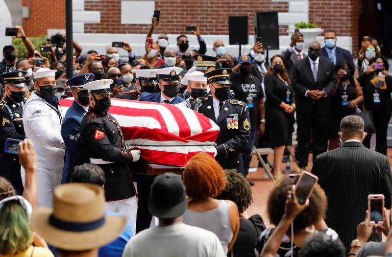 The casket of late U.S. Congressman John Lewis is carried outside the Brown Chapel A.M.E. Church, in Selma