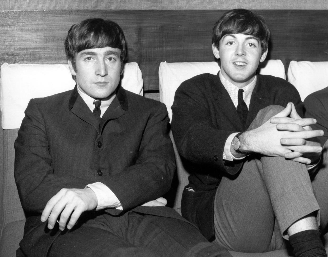 1st November 1963:  Two members of Liverpudlian pop group The Beatles, John Lennon (1940 - 1980), singer and guitarist, left, and Paul McCartney, singer and bass guitarist.  (Photo by Fox Photos/Getty Images)