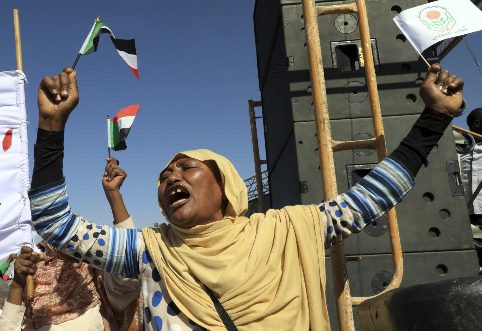 Supporters of Sudan’s President Omar al-Bashir attend a pro-government rally in Khartoum, Sudan, Wednesday, Jan. 9, 2019. Al-Bashir told the gathering of several thousands of supporters in the capital that he is ready to step down only “through election.” The remarks come after three weeks of anti-government protests. (AP Photo/Mahmoud Hjaj)