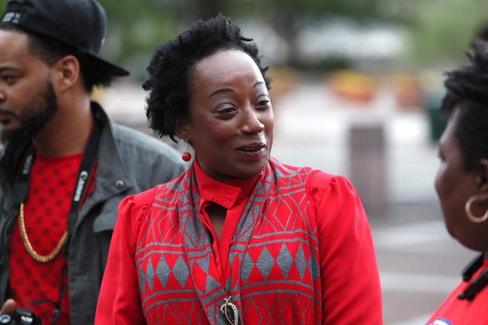 Mayoral candidate Pamela Moses chats with attendess of the May Day gathering outside of city hall in downtown Memphis on Wednesday, May 1, 2019. 