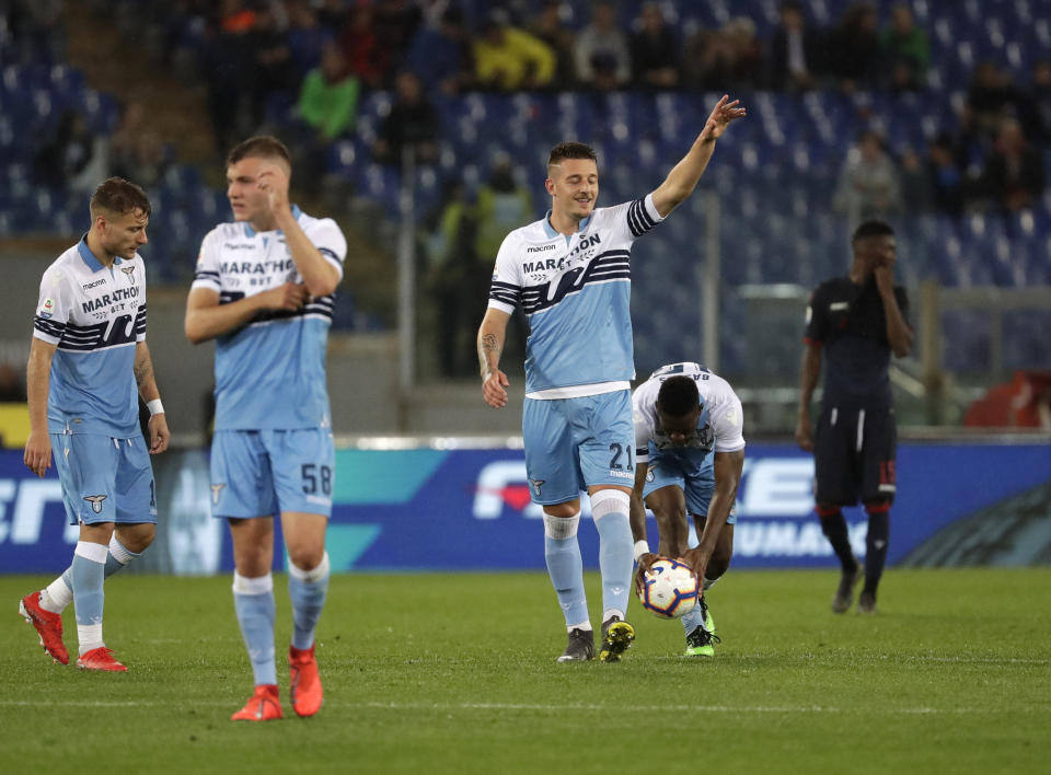 Lazio's Sergej Milinkovic Savic celebrates after scoring his side third goal during an Italian Serie A soccer match between Lazio and Bologna, at the Olympic stadium in Rome, Monday, May 20, 2019. (AP Photo/Andrew Medichini)