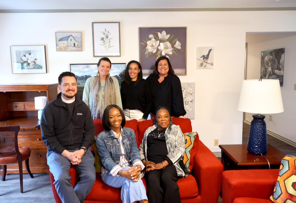 Staff members for the Magdalene House OKC and Magdalene House/Thistle Farms network are seen on April 10 in Oklahoma City. In the front row from left are the Rev. Tim Baer, Terrie Moore and Donna Spears. In the back row from left are Becca Stevens, Lakitia Bates and Shannon Hartsock.