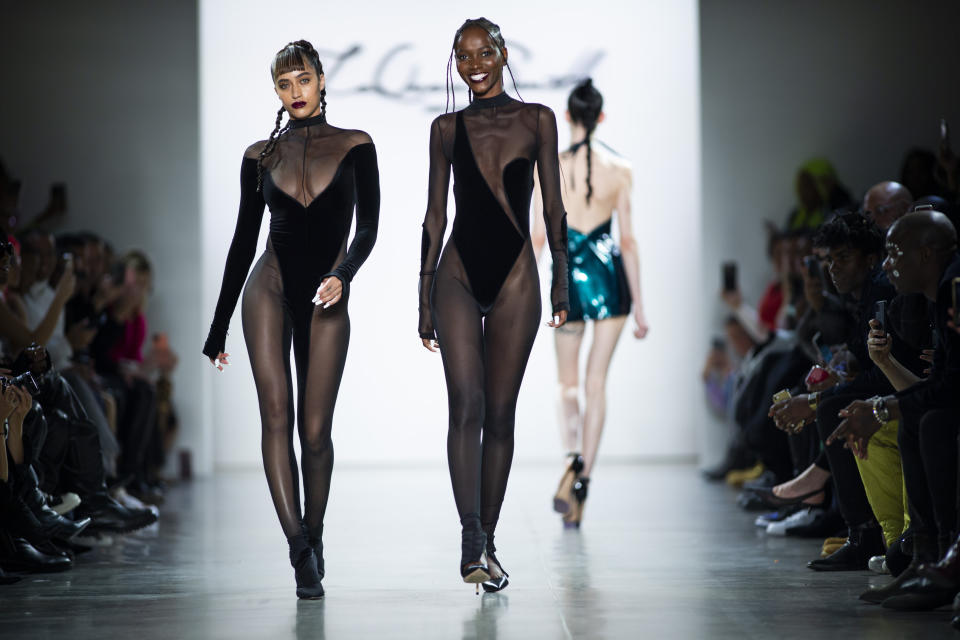 The LaQuan Smith collection is modeled during Fashion Week, Saturday, Feb. 8, 2020, in New York. (AP Photo/Eduardo Munoz Alvarez)