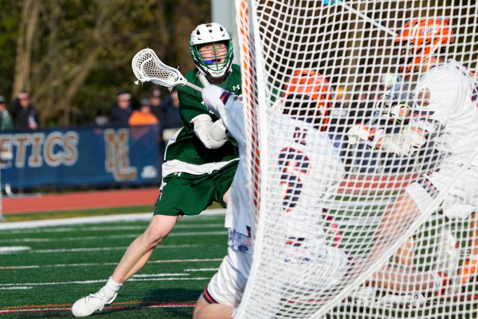 Gray Doyle watches as his ball goes in the net as he scores the eighth and final goal for Delbarton.  Delbarton beat Mountain Lakes, 8-4. Tuesday, April 18, 2023 