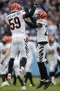 Cincinnati Bengals cornerback Cam Taylor-Britt (29) and linebacker Akeem Davis-Gaither (59) celebrate a misses Tennessee Titans field goal attempt during the first half of an NFL football game, Sunday, Nov. 27, 2022, in Nashville, Tenn. (AP Photo/Gerald Herbert)