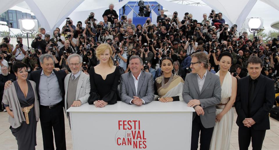 From left, jury members Lynne Ramsay, Ang Lee, Steven Spielberg, Nicole Kidman, Daniel Auteuil, Vidya Balan, Christoph Waltz, Naomi Kawase and Cristian Mungiu pose for photographers during a photo call for the jury at the 66th international film festival, in Cannes, southern France, Wednesday, May 15, 2013. (AP Photo/Francois Mori)