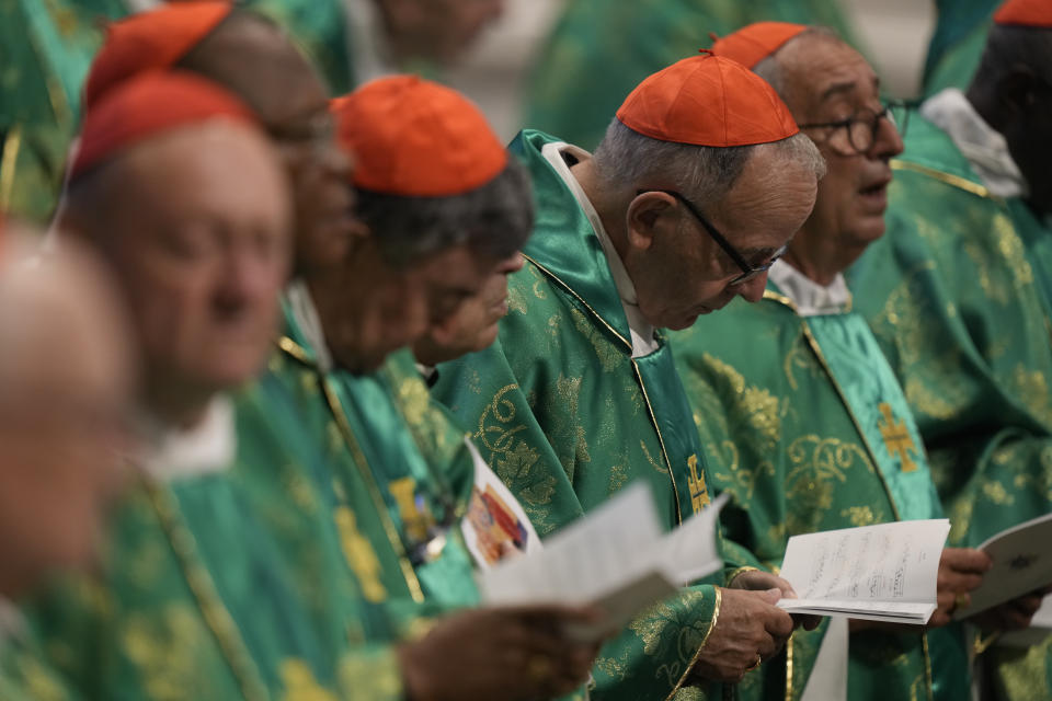 Cardinals attend a mass celebrated by Pope Francis in St. Peter's Basilica at The Vatican for the newly-created cardinals, Tuesday, Aug. 30, 2022, that concludes a two-day consistory on the Praedicate Evangelium (Preach the Gospel) apostolic constitution reforming the Roman Curia which was promulgated in March. Francis created 20 new cardinals on Saturday. (AP Photo/Andrew Medichini)