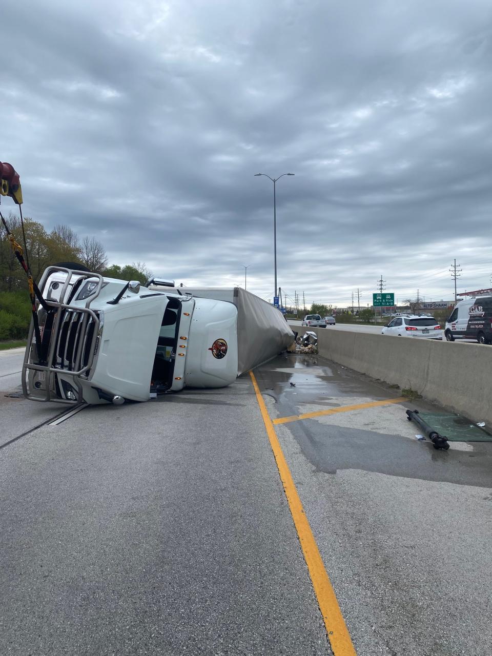 A truck overturned after colliding with another vehicle on northbound Interstate 41 in Menomonee Falls on Thursday, May 2, closing two lanes of traffic for about six hours.
