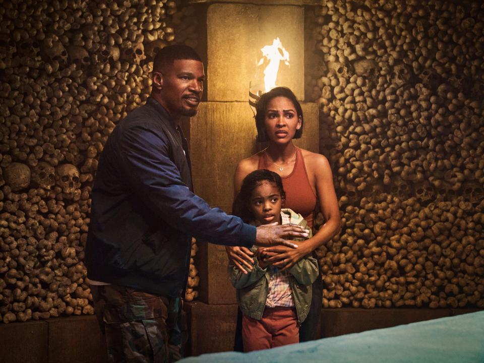 Jamie Foxx as Bud, Zion Broadnax as Paige and Meagan Good as Jocelyn in the Netflix movie "Day Shift."