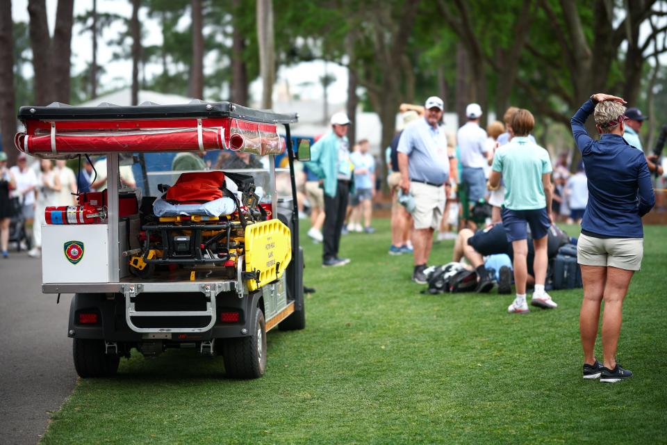 Paramedics check on a fan, Hendersonville's Mike Norman, who was struck by a ball hit by Sepp Straka of Austria on the first hole during the second round of the RBC Heritage at Harbour Town Golf Links on April 19, 2024 in Hilton Head Island, South Carolina. (Photo by Jared C. Tilton/Getty Images)
(Credit: Jared C. Tilton, Getty Images)