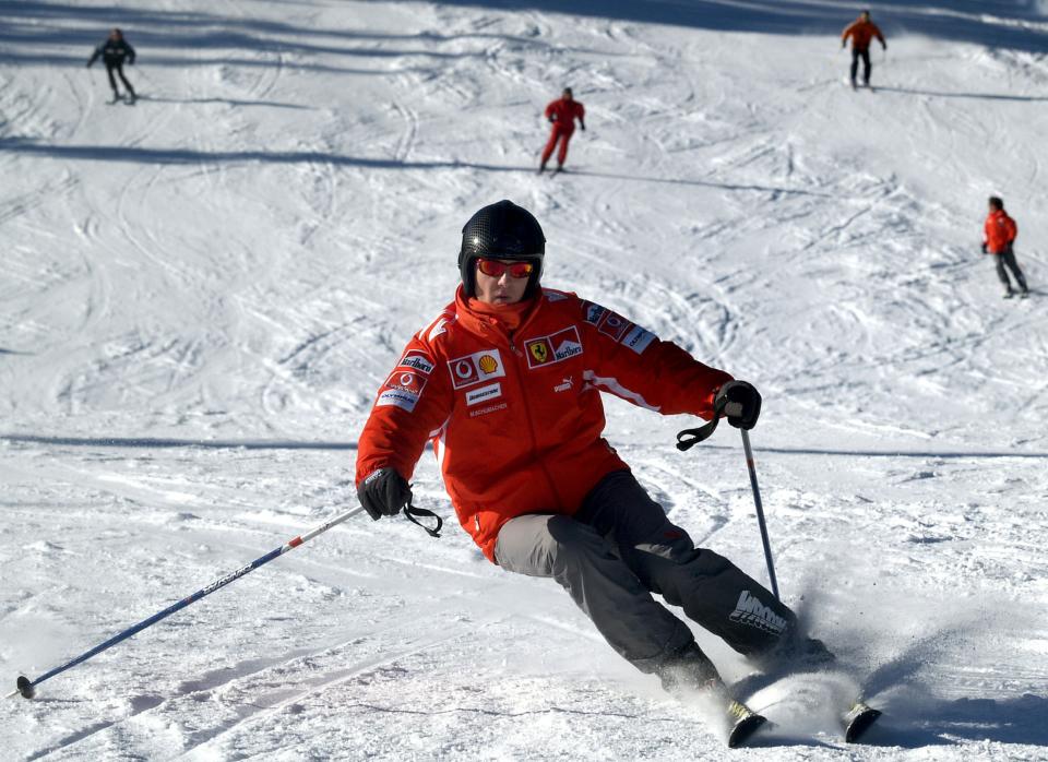 Former Formula One world champion Michael Schumacher skis in the northern Italian resort of Madonna Di Campiglio in this January 13, 2005 file photo. Schumacher suffered a serious head injury while skiing in the French Alps resort of Meribel, French media reported on December 29, 2013. REUTERS/stringer (ITALY - Tags: SPORT MOTORSPORT F1 DISASTER TPX IMAGES OF THE DAY)