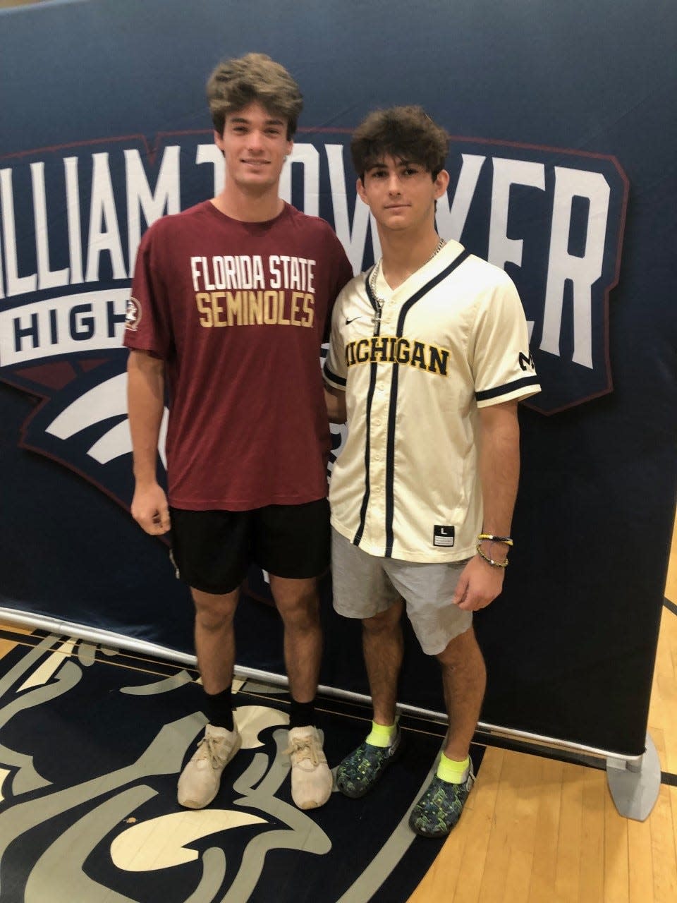 Dwyer High outfielder Matt Davis, left, and pitcher Bradley Link, who signed with Power Five schools, attend the national signing day ceremony on Feb 1 in Palm Beach Gardens.