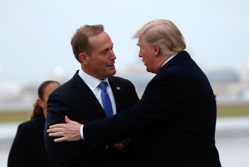 U.S. President Donald Trump greets Ted Budd, Republican candidate from North Carolina's 13th district in Charlotte