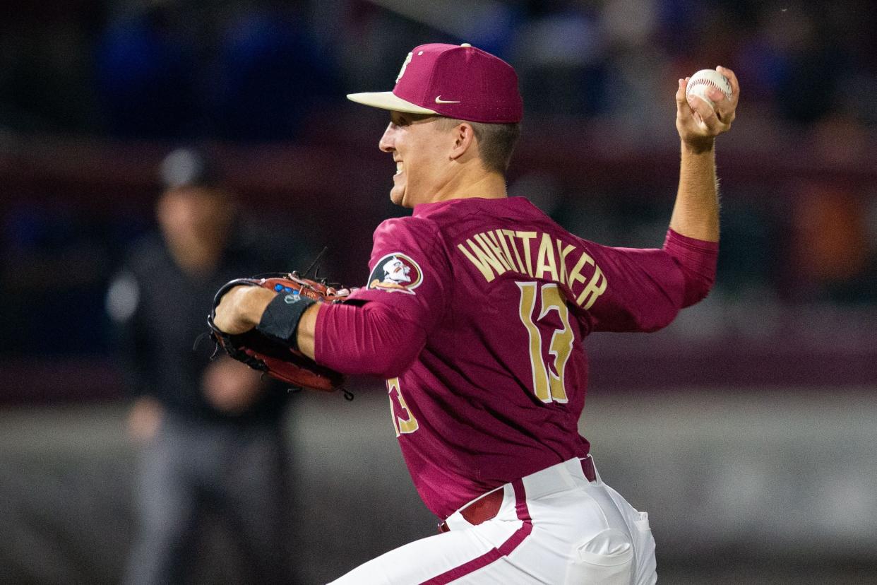 Florida State pitcher Conner Whittaker (13) pitches to a batter. The Florida Gators defeated the Florida State Seminoles 9-5 on Tuesday, March 21, 2023. 