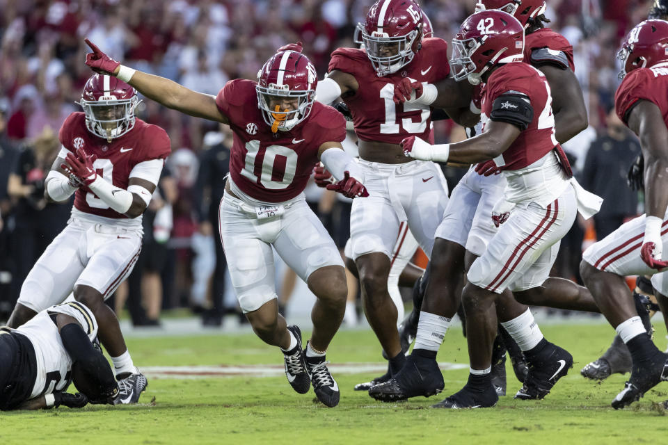 Alabama linebacker Henry To'oTo'o (10) celebrates a third-down stop against Vanderbilt during the first half of an NCAA college football game Saturday, Sept. 24, 2022, in Tuscaloosa, Ala. (AP Photo/Vasha Hunt)