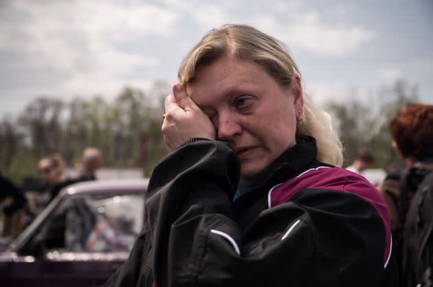 A refugee from the Russian-occupied city of Mariupol, Ukraine, Nadiajda Vorotylina, cries on arriving at a Ukrainian processing center in Zaporizhzhia on May 2. (Photo: ED JONES via Getty Images)